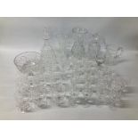 COLLECTION OF STUART CRYSTAL GLASSES, DECANTERS, BOWLS AND VASES ETC.