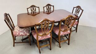 A GOOD QUALITY MAHOGANY FINISH TWIN PEDESTAL DINING SET COMPRISING OF EXTENDING DINING TABLE W