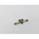 A "MURRLE BENNETT" 9CT GOLD TURQUOISE AND SEED PEARL BAR BROOCH.