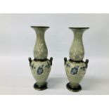 PAIR OF VINTAGE DECORATIVE VASES ON A GREEN GROUND,