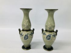 PAIR OF VINTAGE DECORATIVE VASES ON A GREEN GROUND,