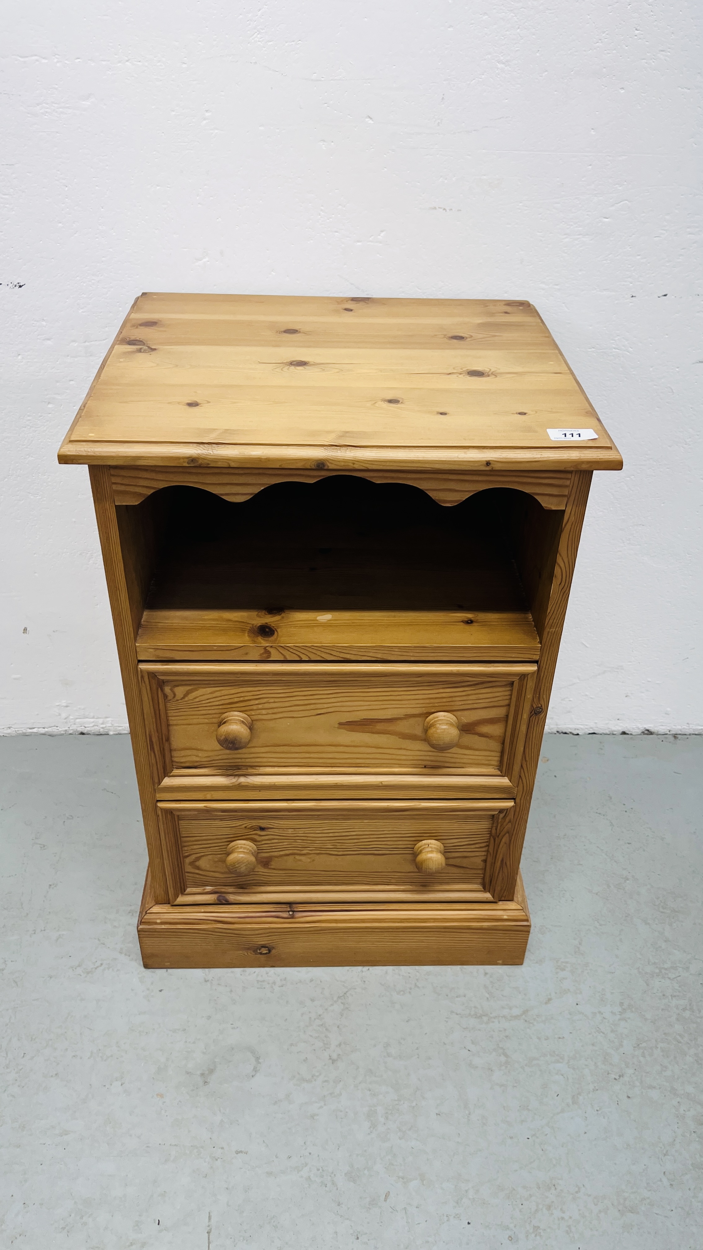 A WAXED PINE TWO DRAWER BEDSIDE CABINET WIDTH 45CM. DEPTH 38CM. HEIGHT 67CM. - Image 2 of 6