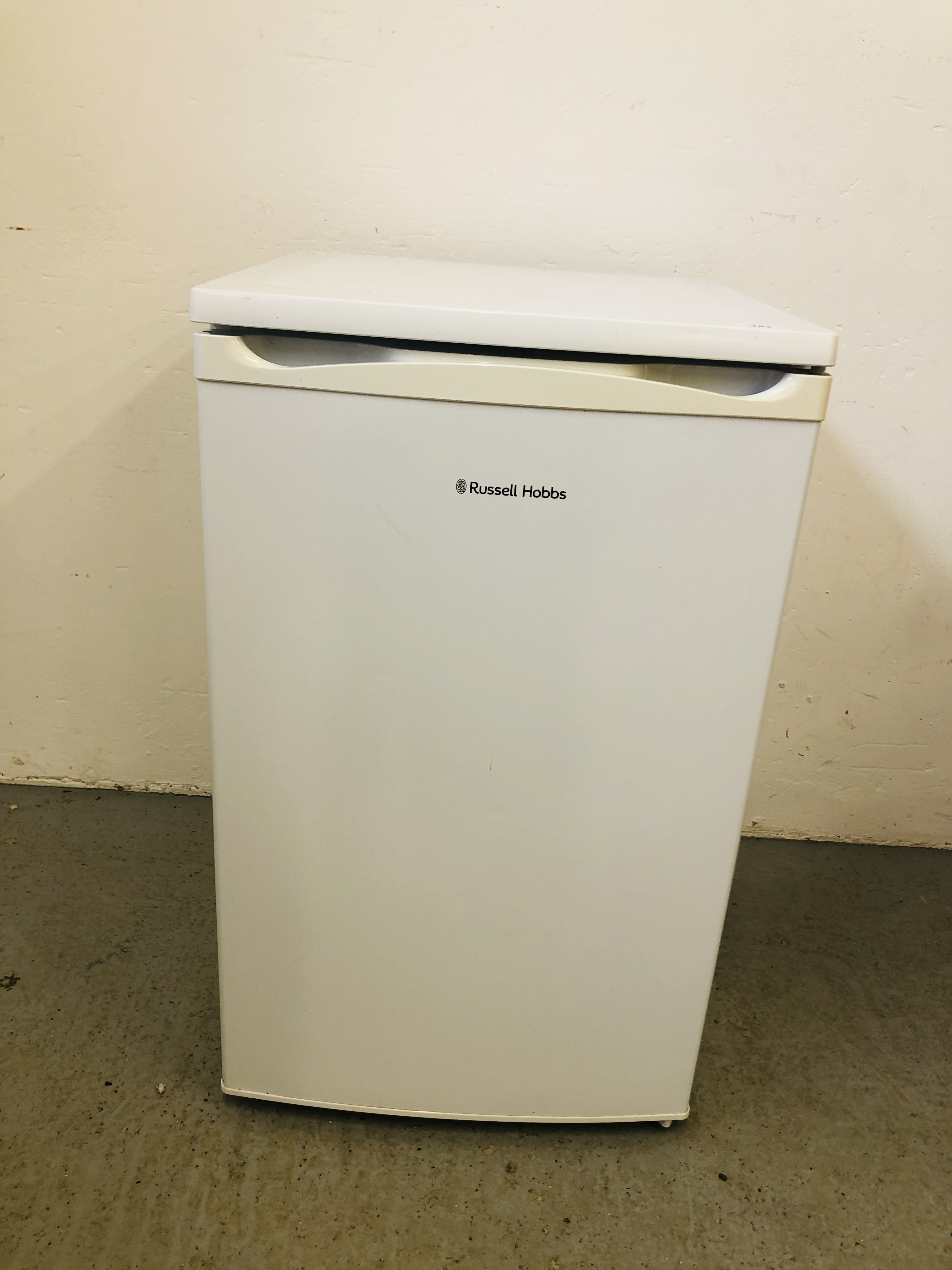 A RUSSELL HOBBS UNDERCOUNTER THREE DRAWER FREEZER - SOLD AS SEEN.