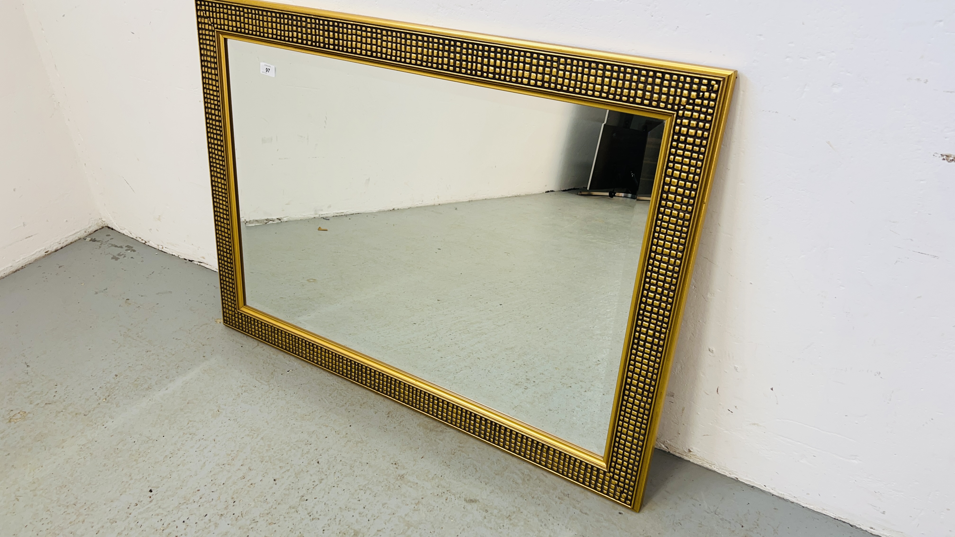 LARGE MODERN GILT FRAMED MIRROR 60CM X 90CM.