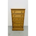 A GOOD QUALITY WAXED PINE SIX DRAWER TOWER CHEST WIDTH 60CM. DEPTH 40CM. HEIGHT 111CM.