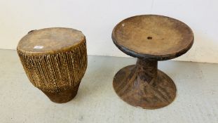 AN AFRICAN SKIN DRUM AND HAND CARVED AFRICAN STAND H 37CM, D 41CM.