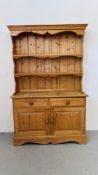 WAXED PINE DRESSER WITH TWO DRAWER TWO DOOR BASE WIDTH 122CM. DEPTH 43CM. HEIGHT 192CM.