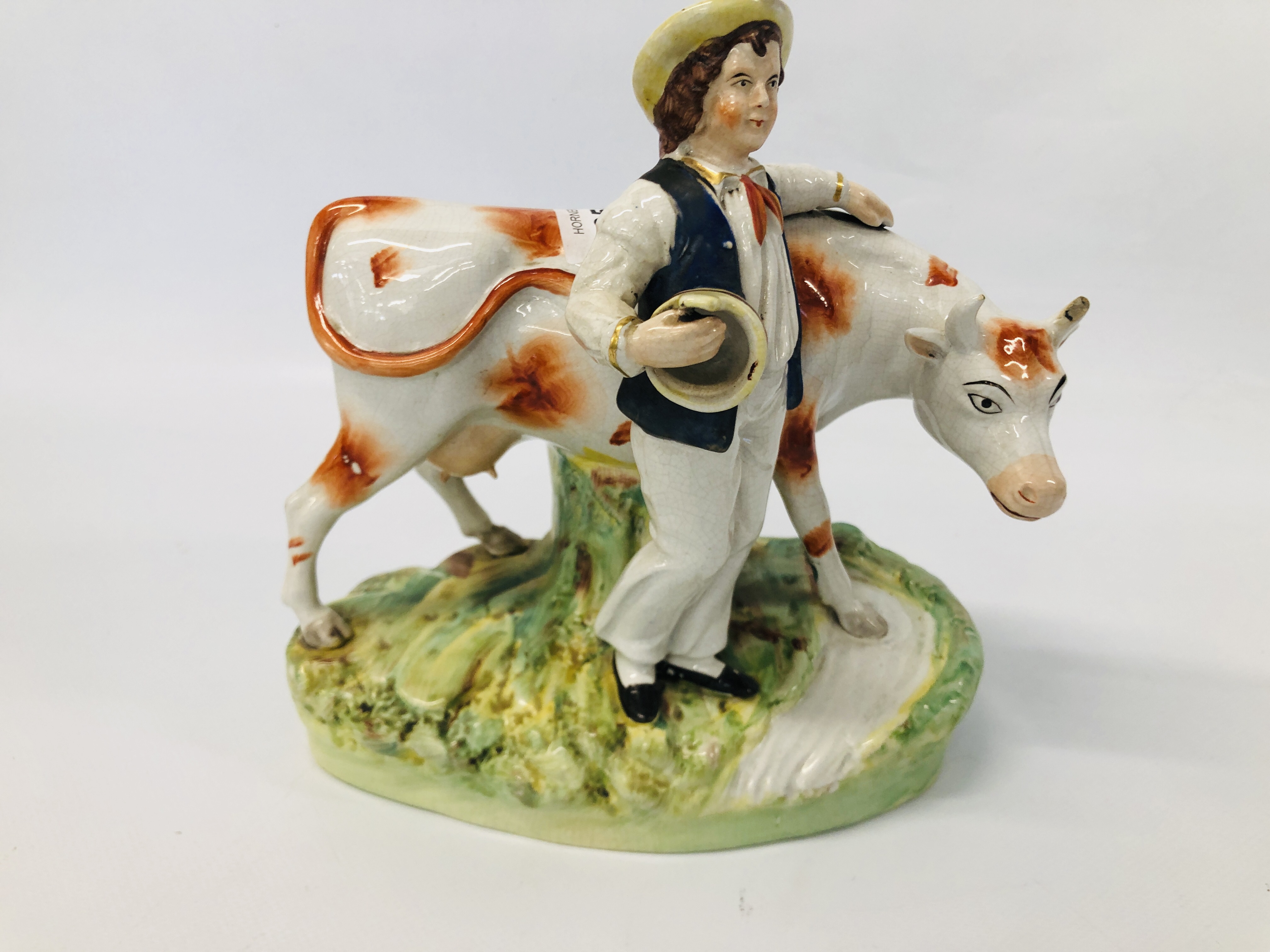 PAIR OF STAFFORDSHIRE TYPE FIGURES OF A MILK MAID AND A BOY STANDING BY A COW A/F HEIGHT 21CM. - Image 7 of 8
