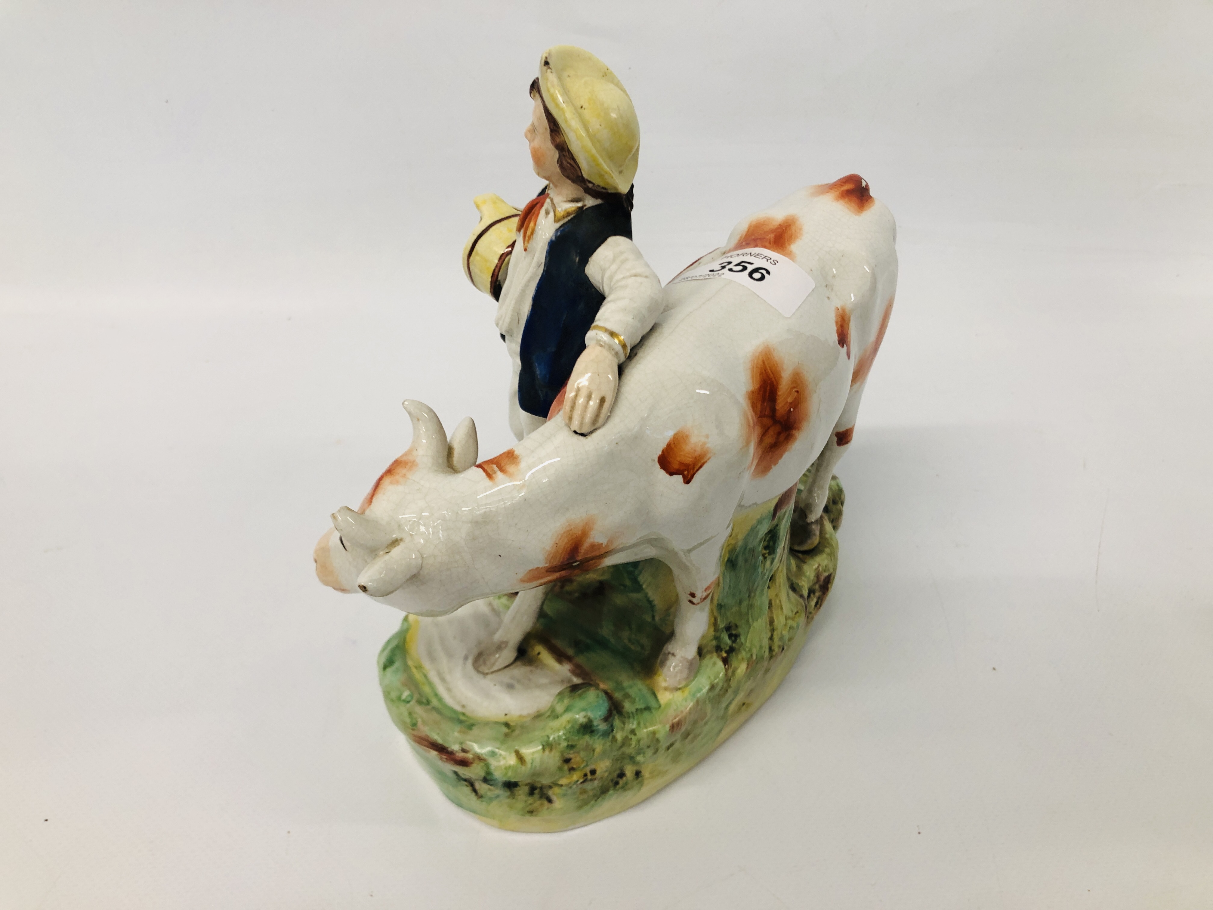 PAIR OF STAFFORDSHIRE TYPE FIGURES OF A MILK MAID AND A BOY STANDING BY A COW A/F HEIGHT 21CM. - Image 8 of 8