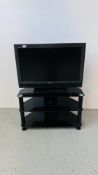 SONY BRAVIA 32 INCH TELEVISION MODEL KDL-3243000 ALONG WITH A MODERN BLACK GLASS THREE TIER STAND -