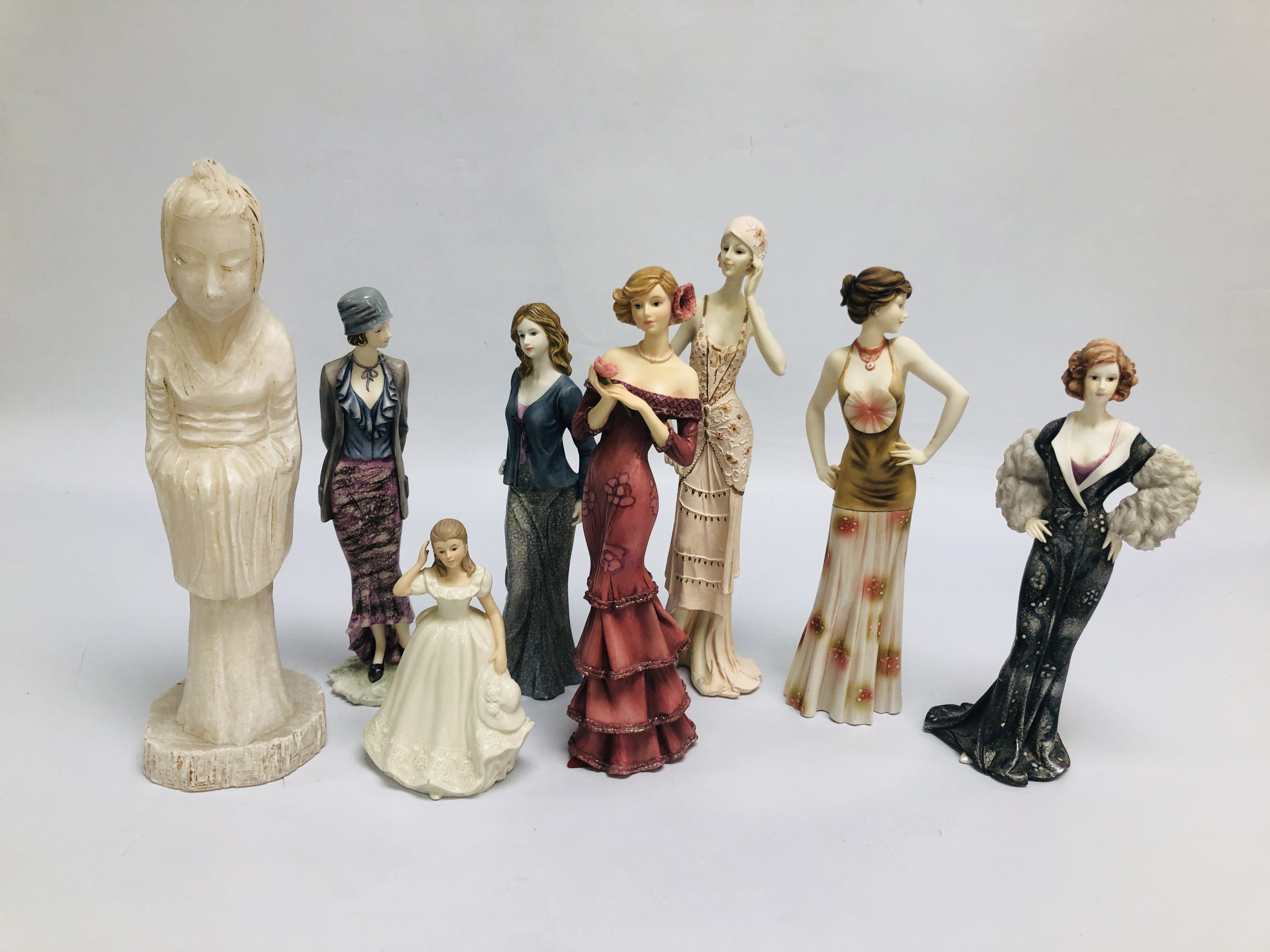SIX REGAL FIGURINES + ONE OTHER ORIENTAL HARDSTONE CARVING.