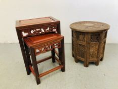 NEST OF TWO ORIENTAL CARVED HARDWOOD OCCASIONAL TABLES ALONG WITH A CARVED FOLDING ETHNIC