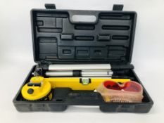 A BOXED LASER LEVEL TOOL KIT.