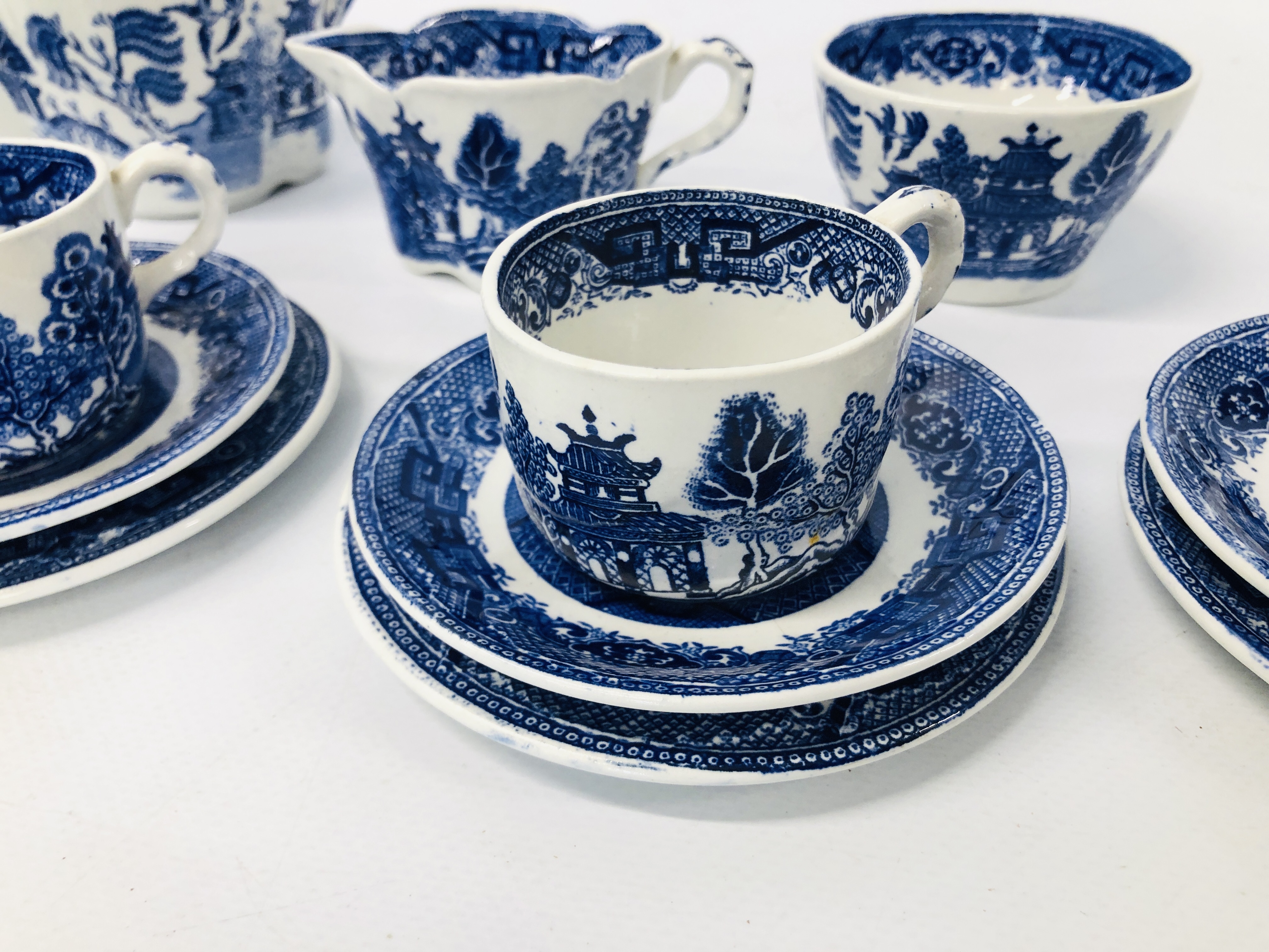 VINTAGE MINATURE 15 PIECE BLUE AND WHITE WILLOW PATTERN TEA SET MARKED RIDGWAY 1832 SEMI CHINA. - Image 3 of 8