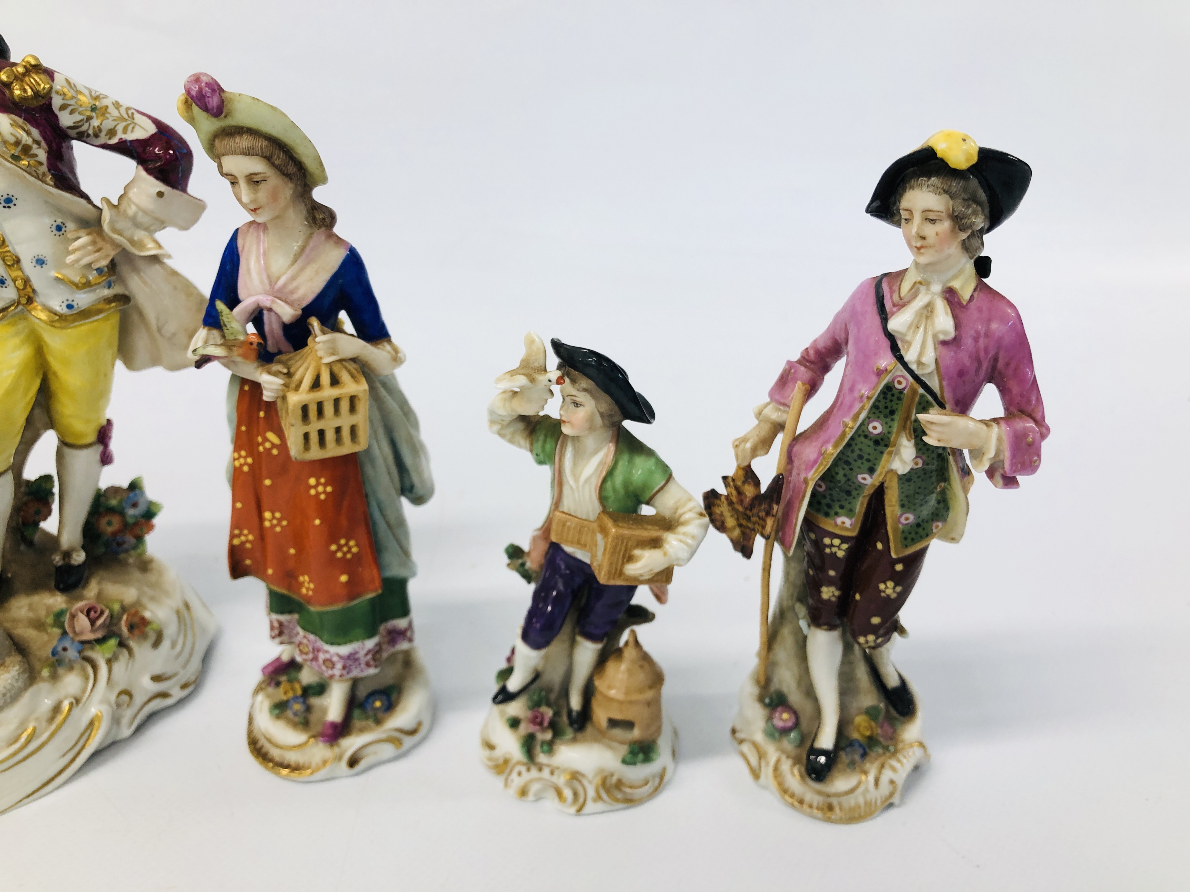 A GROUP OF CONTINENTAL HARDPASTE FIGURES INCLUDING A SITZENDORF GROUP OF A STANDING GENTLEMAN AND A - Image 2 of 11