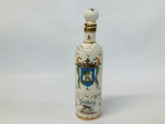 A HARD PASTE POLYCHROME ARMORIAL BOTTLE WITH STOPPER INSCRIBED "JOCKEY",