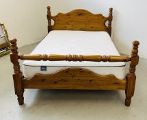 A SOLID PINE DOUBLE BEDSTEAD COMPLETE WITH SILENT NIGHT POCKET 800 MATTRESS