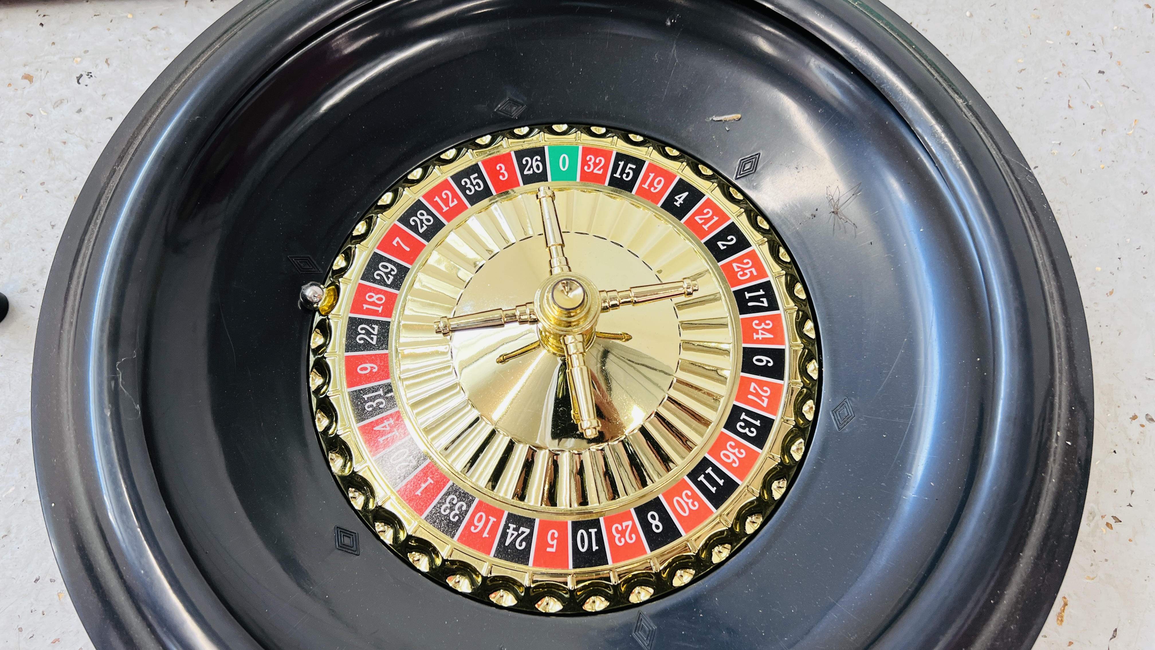 A LARGE TABLE TOP ROULETTE BOARD AND ROULETTE WHEEL AND STICK - Image 2 of 4