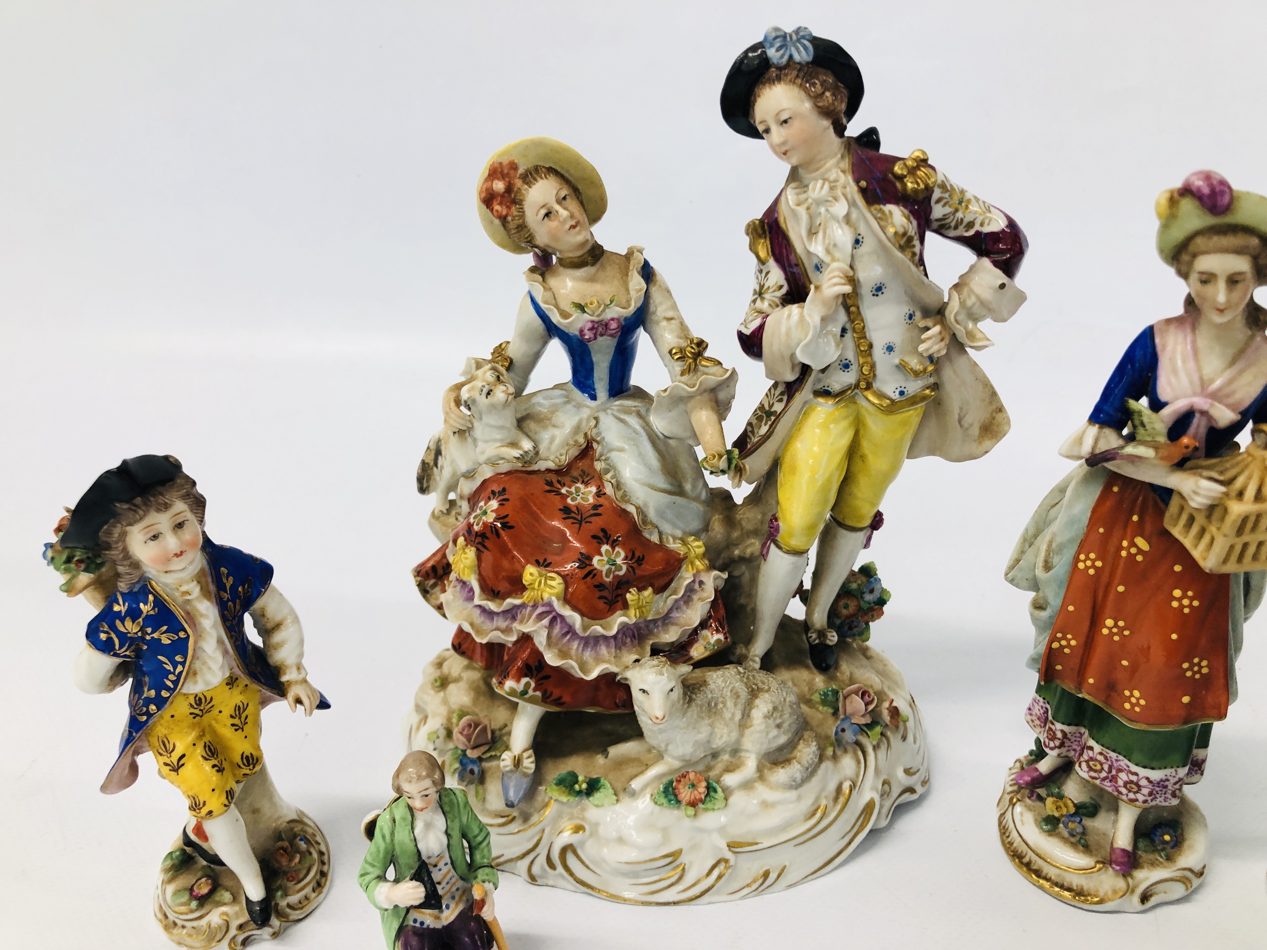 A GROUP OF CONTINENTAL HARDPASTE FIGURES INCLUDING A SITZENDORF GROUP OF A STANDING GENTLEMAN AND A - Image 4 of 11