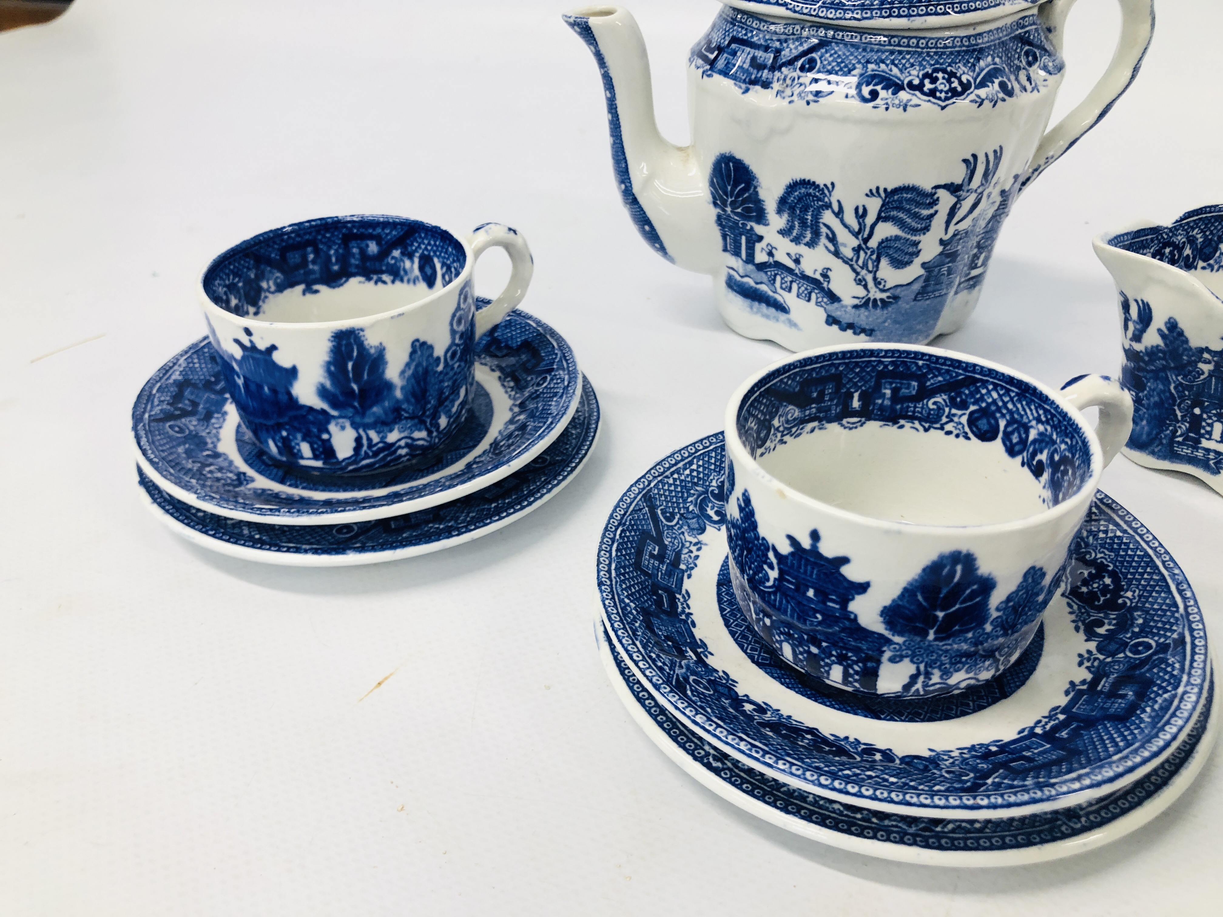 VINTAGE MINATURE 15 PIECE BLUE AND WHITE WILLOW PATTERN TEA SET MARKED RIDGWAY 1832 SEMI CHINA. - Image 4 of 8