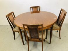 A MID CENTURY G PLAN CIRCULAR TEAK EXTENDING DINING TABLE AND FOUR CHAIRS D 122CM.