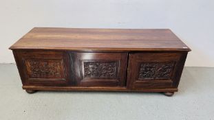 A LOW LEVEL THREE DOOR CABINET WITH CARVED GRAPE VINE DESIGN TO PANELS WIDTH 180CM. DEPTH 62CM.