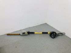 A RYOBI RPT400 LONG REACH ADJUSTABLE ANGLE HEAD ELECTRIC HEDGE CUTTER - SOLD AS SEEN.