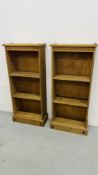 A PAIR OF MEXICAN PINE CORONA BOOK SHELVES WIDTH 46CM. DEPTH 20CM. HEIGHT 104CM.