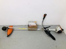 STIHL FS 55 PETROL STRIMMER ALONG WITH BOX OF SPARES SUCH AS BLADE TOOLS AND INSTRUCTIONS - SOLD AS