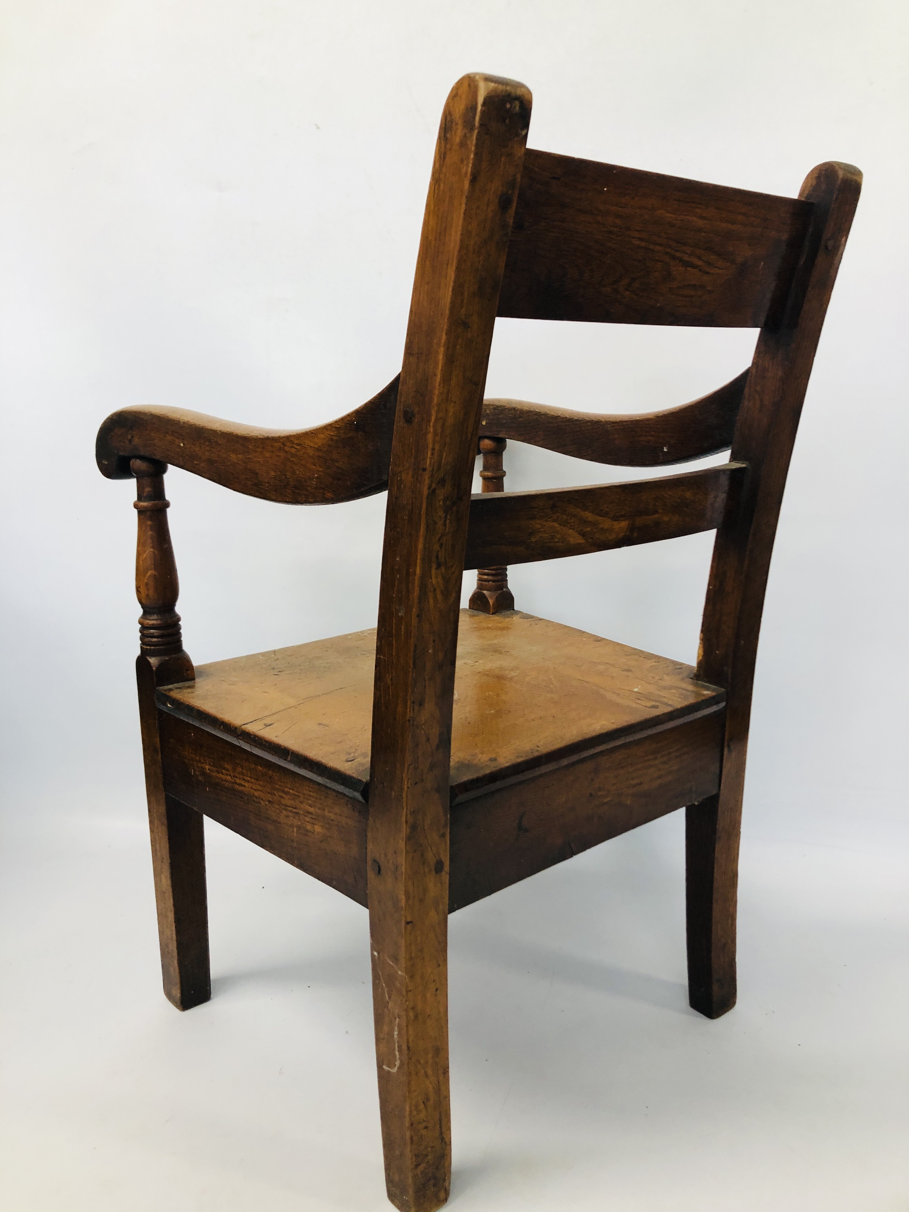 A CHILD'S OAK ELBOW CHAIR HEIGHT 57CM. - Image 3 of 4