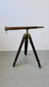 A BRASS TELESCOPE AND TRIPOD BEARING ROSS LONDON