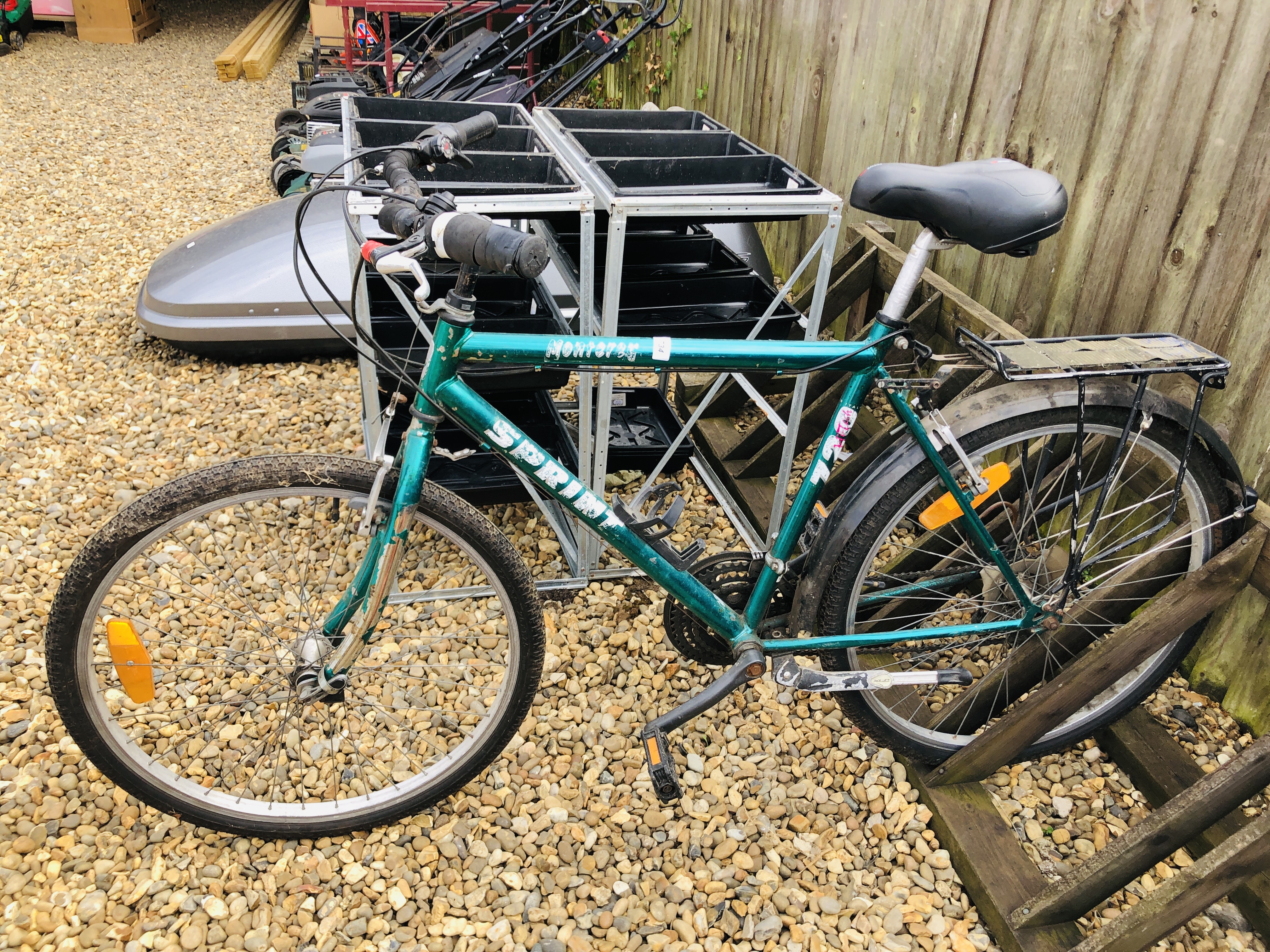 A GENTS GREEN SPRINT BICYCLE WITH CYCLE CARRIER