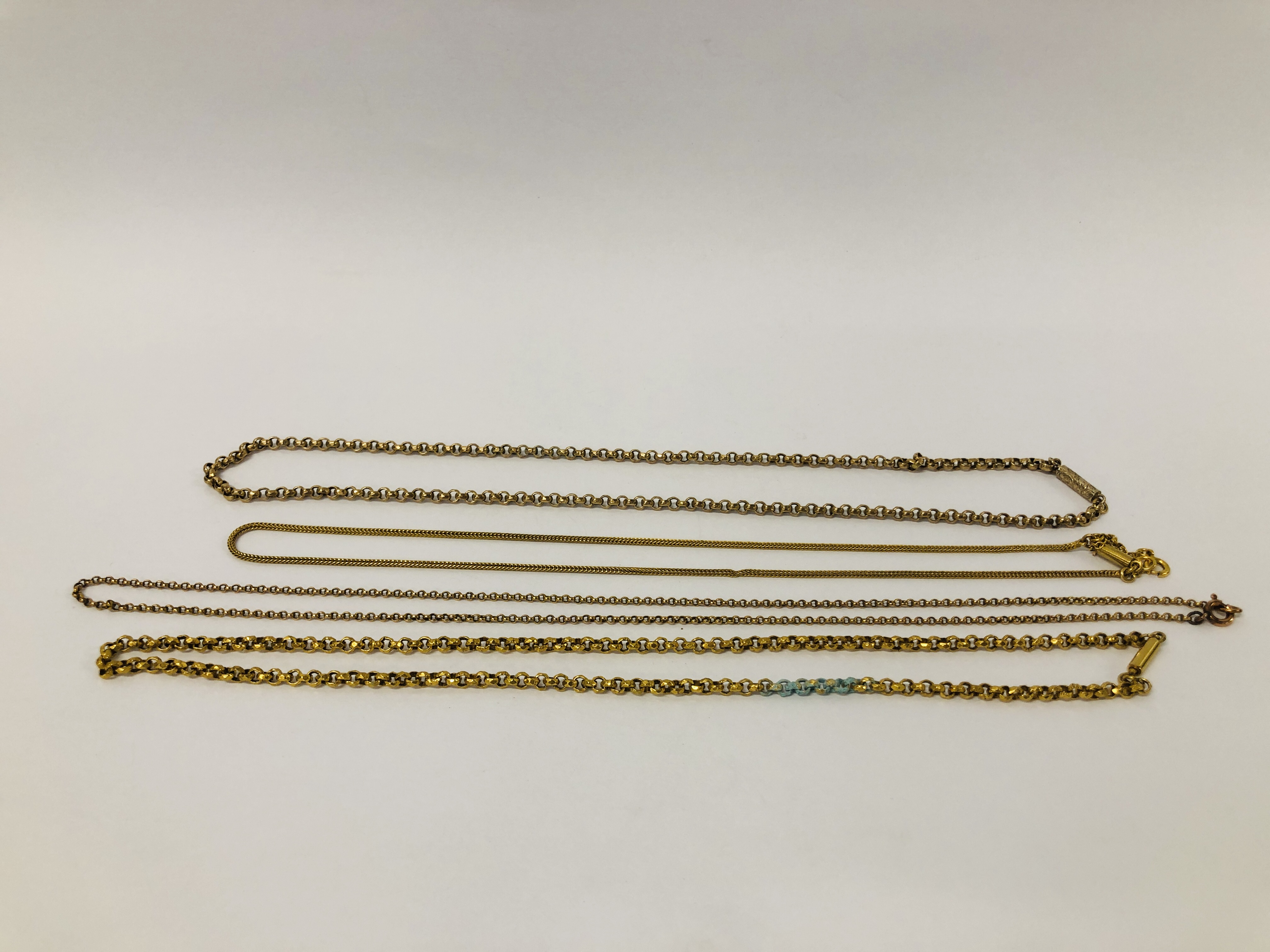 FOUR VARIOUS YELLOW METAL NECKLACES - NO VISIBLE HALL MARKS