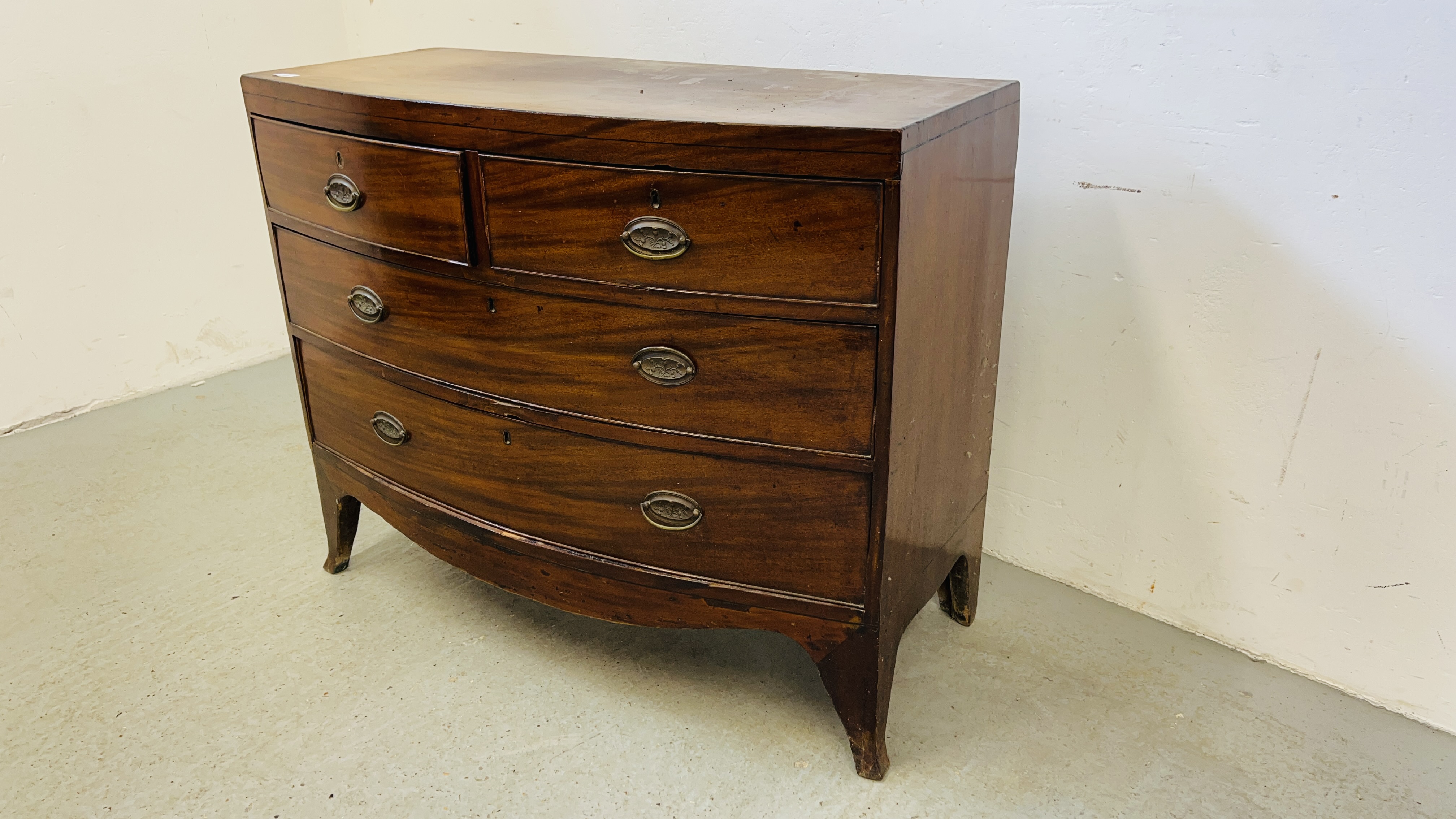 A GEORGE III MAHOGANY BOW FRONT CHEST OF FOUR DRAWERS, LATER HANDLES, A/F CONDITION, W 104CM.