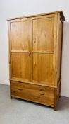 A MODERN LIGHT OAK DOUBLE WARDROBE WITH TWO DRAWERS TO BASE W 127CM, D 63CM, H 186CM.