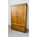 A MODERN LIGHT OAK DOUBLE WARDROBE WITH TWO DRAWERS TO BASE W 127CM, D 63CM, H 186CM.