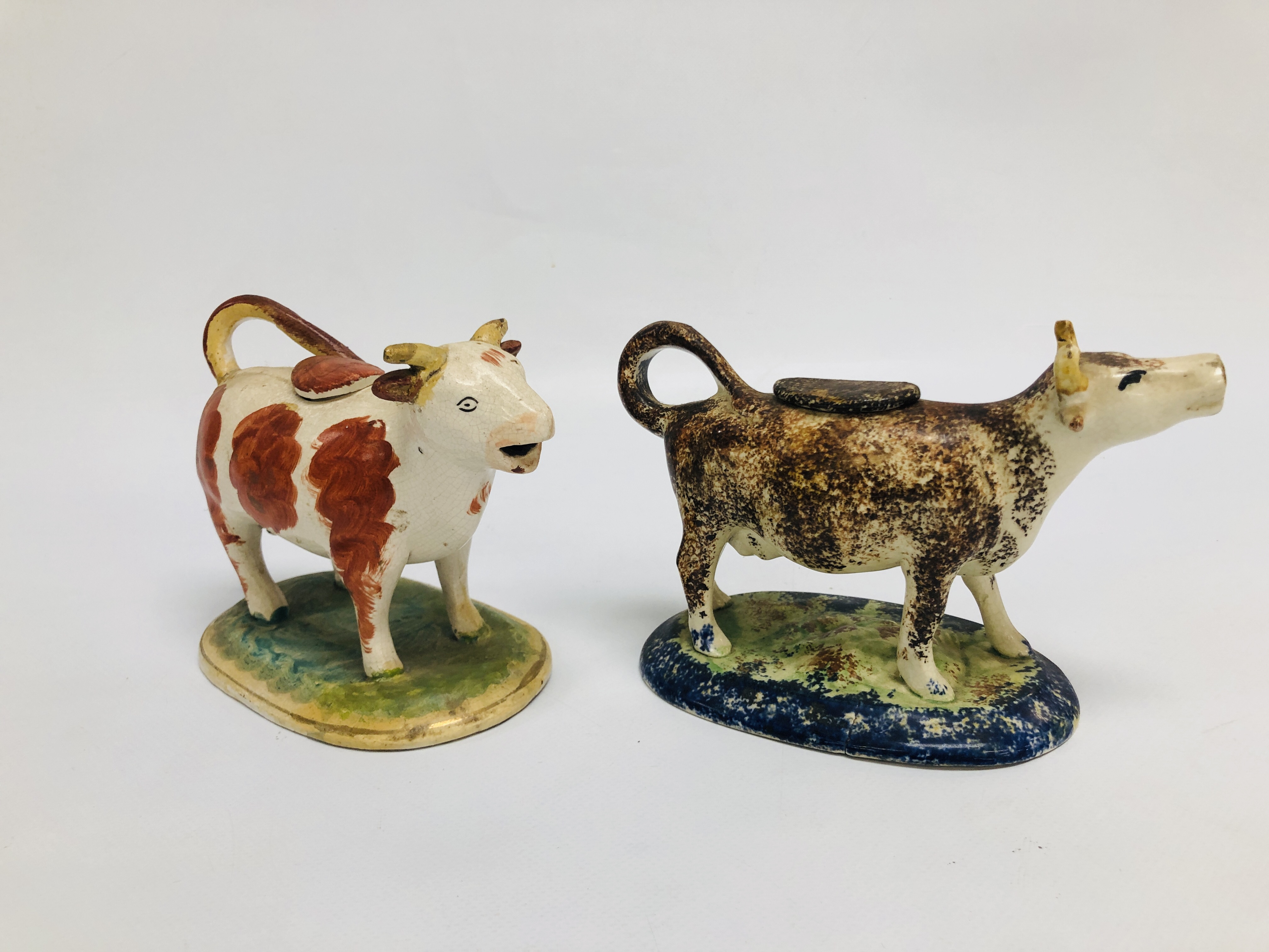 A WHIELDON STYLE COW CREAMER, c.1790, RETAINING COVER, L 17.