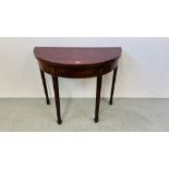 A GEORGE III MAHOGANY DEMI LUNE FOLDING TEA TABLE, D 89.5CM.