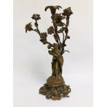 A C19th FRENCH GILT METAL THREE BRANCH CANDELABRUM, THE BASE IN THE FORM OF STANDING WOMAN,