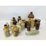 A COLLECTION OF 22 STONE GLAZED BOTTLES TO INCLUDE BULLARD AND SONS NORWICH,