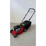 A SOVEREIGN PETROL LAWN MOWER FITTED WITH BRIGGS AND STRATTON XC35 ENGINE COMPLETE WITH GRASS BOX.