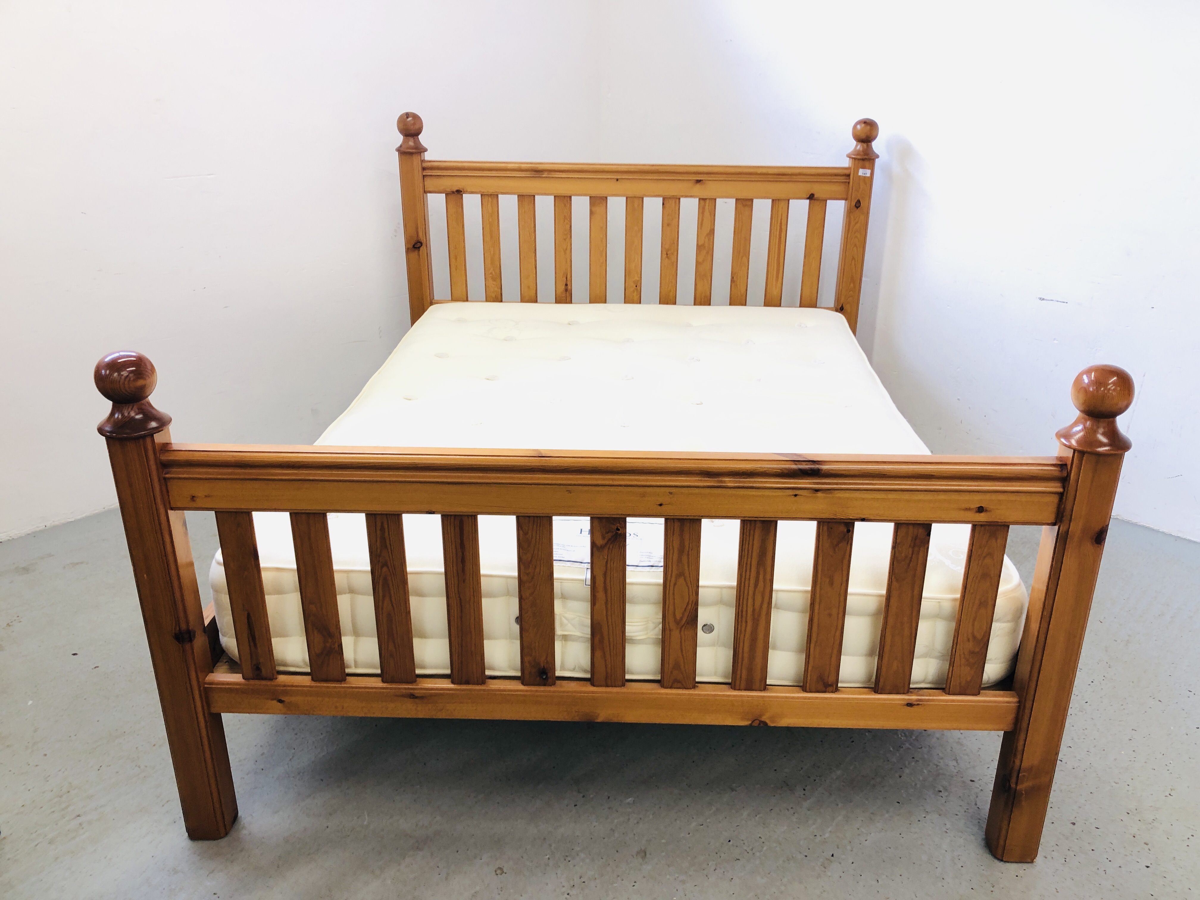 A GOOD QUALITY SOLID HONEY PINE KINGSIZE BED WITH HYPNOS "BARONET" POCKET SPRUNG MATTRESS.