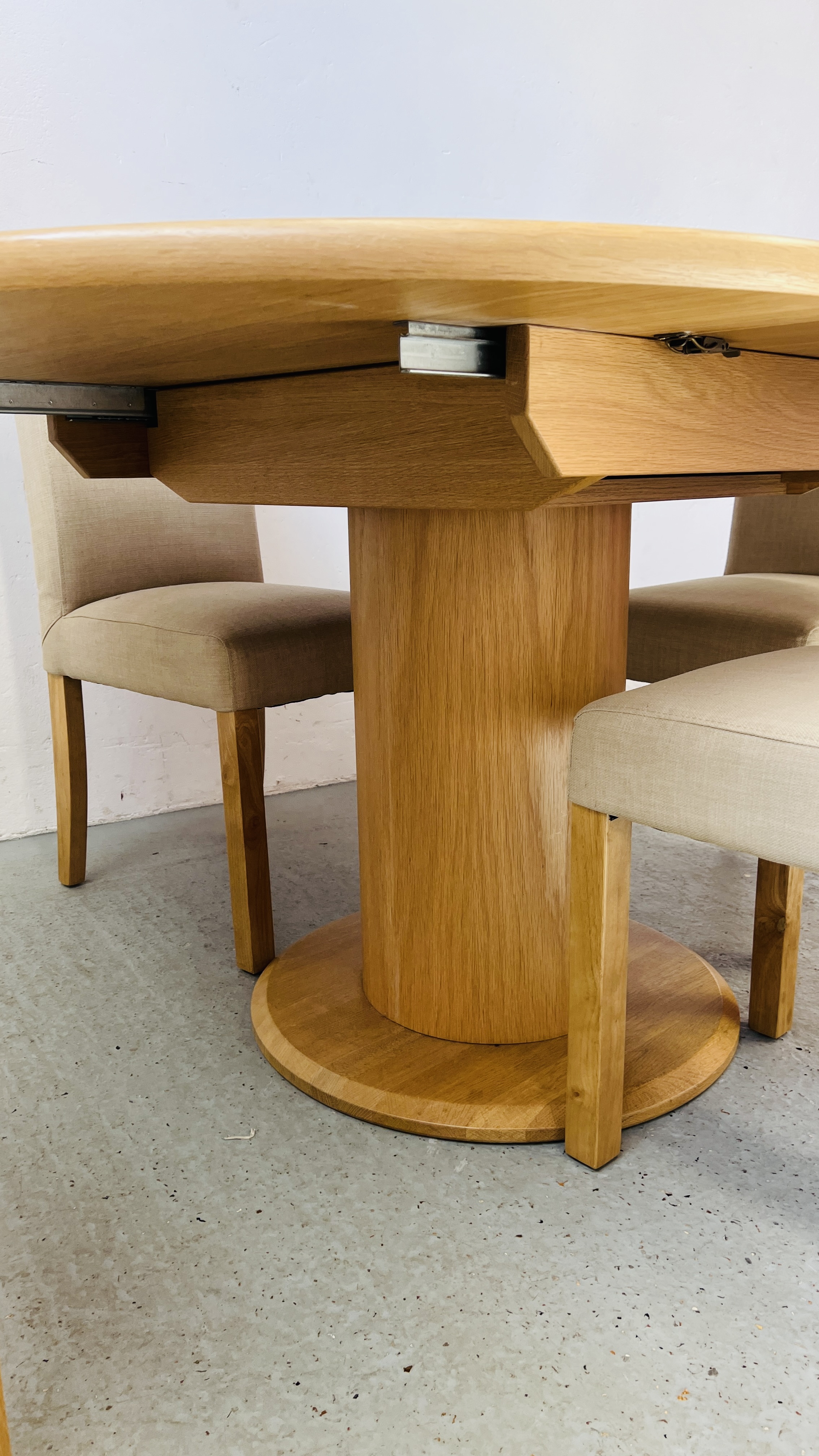 GOOD QUALITY MODERN BEECHWOOD FINISH CIRCULAR EXTENDING DINING TABLE ON SINGLE PEDESTAL BASE DIA. - Image 9 of 11