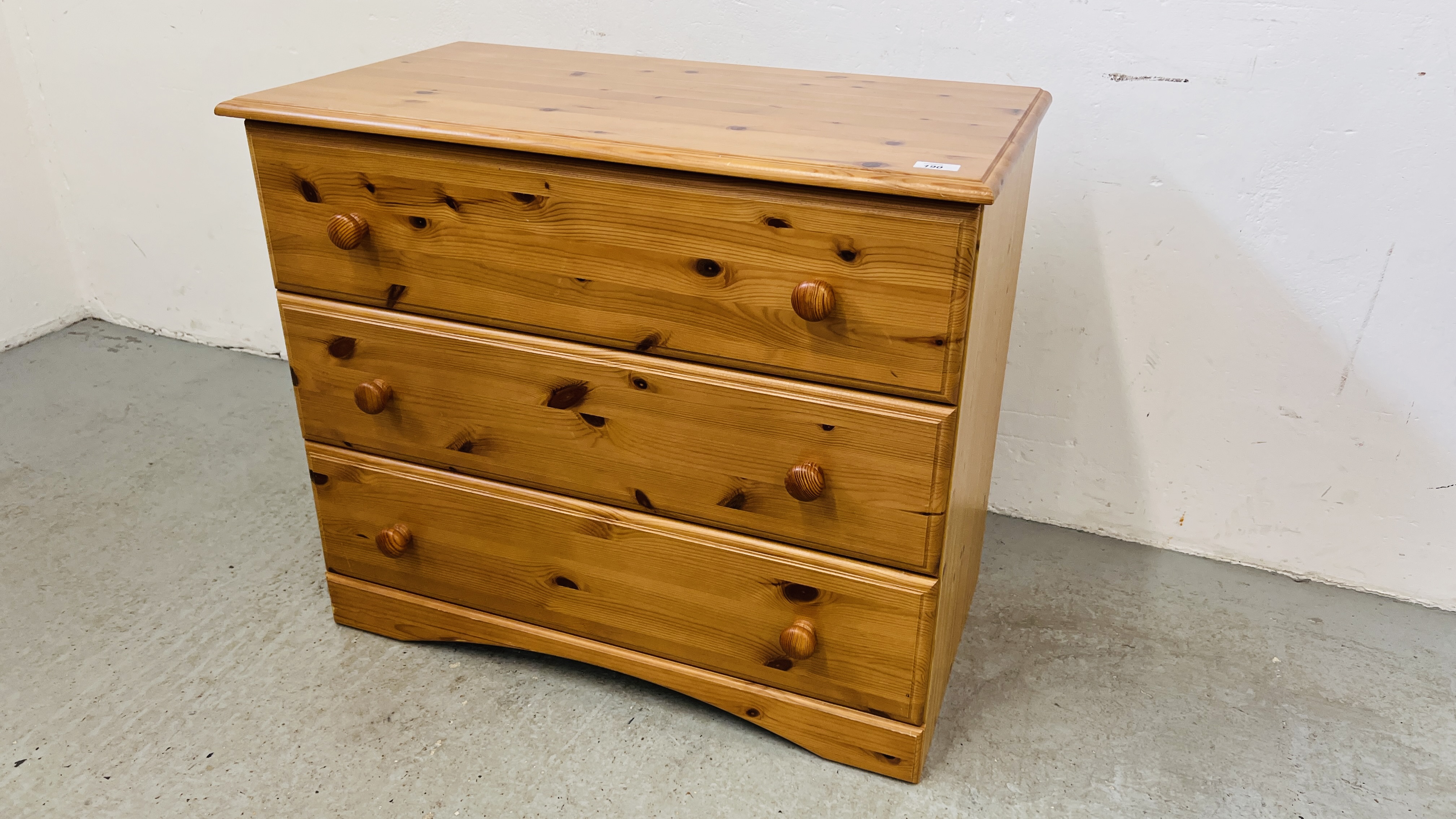 A MODERN PINE FINISH THREE DRAWER CHEST W 81CM, D 44CM, H 69CM.