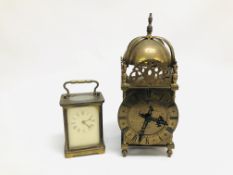 A FRENCH CARRIAGE CLOCK, THE FACE BEING PLASTIC + A MANTEL CLOCK OF LANTERN FORM.