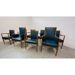 A SET OF EIGHT MID CENTURY OAK FRAMED CHAIRS WITH BLUE LEATHER UPHOLSTERED SEATS AND BACKS (2 X