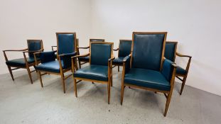 A SET OF EIGHT MID CENTURY OAK FRAMED CHAIRS WITH BLUE LEATHER UPHOLSTERED SEATS AND BACKS (2 X