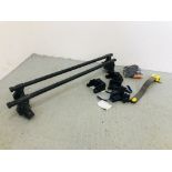 A PAIR OF THULE ROOF RACKS ALONG WITH KEYS AND VARIOUS ACCESSORIES ALONG WITH CAR STEERING WHEEL