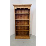 A MODERN SOLID WAXED PINE FULL HEIGHT BOOKSHELF W 91CM, D 34CM, H 184CM.