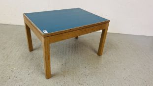 A MID CENTURY OAK FRAMED OCCASIONAL TABLE WITH BLUE TOP BEARING LABEL GORDON RUSSELL LIMITED